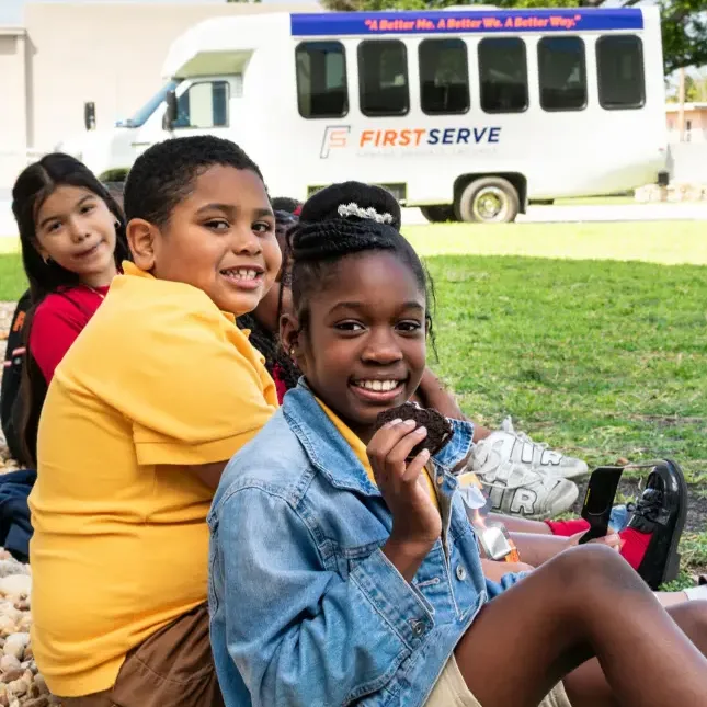 Belle Glade Kids with Bus in background